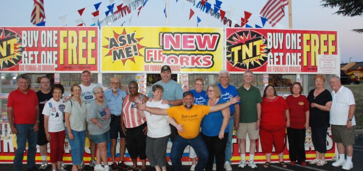 2014 photo of a lot of the fireworks booth volunteers
